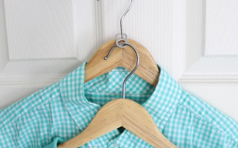 Use pop-tabs to hang extra clothes in your closet