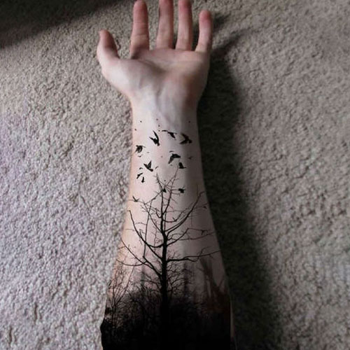 Tattoo design: Moody dark gothic forest with moon above the trees