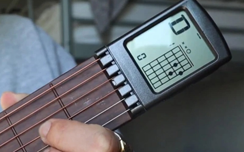 Portable Digital Guitar Trainer Makes Learning Easy