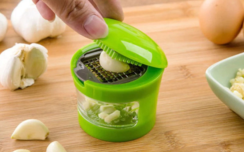 https://cdn2.inspireuplift.com/wp-content/uploads/2022/04/Portable-Garlic-Dicer-Chopper.jpg