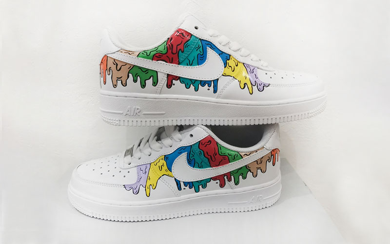 Funky and colorful woman rainbow Nike sneakers